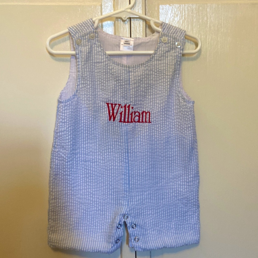 Boys blue seersucker John John with red embroidered “William” 6m